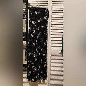 Large, black, sleeveless jumpsuit